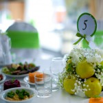number plates on tables with apples